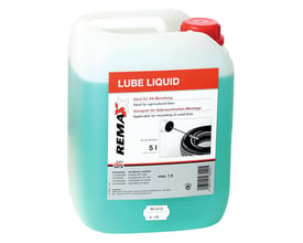 Remaxx Lube Liquid 5L i en hvid plastikkande med en turkisblå væske og et rødt skruelåg. Etiket viser produktinformation og en illustration af dækimontage.