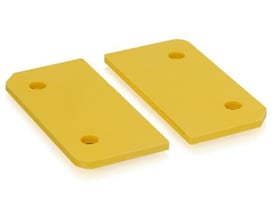 To gule afstandsplader i PCB materiale fra ABB, hver med 2.5 mm tykkelse og to monteringshuller.