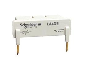 Schneider Electric LA4-DE2U varistor beskyttelse til 110-250V AC/DC, med symboler for varistor og vekselstrøm.