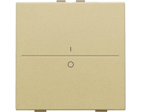 Niko tangent i guld med 'i' og 'o' symboler til 2-tryks betjening, perfekt til moderne boligindretning.