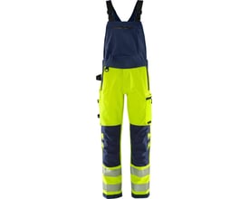 Kansas Fristads Green Hi-Vis overalls i gul/marine, str. C56, med synlige lommer, stretchpaneler og reflekser.