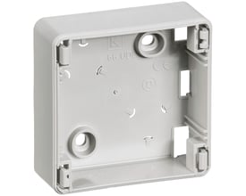 Lauritz Knudsen OPUS 66 underlag 23mm højt og 1 modul bredt, lysegrå med monteringshuller og klips.