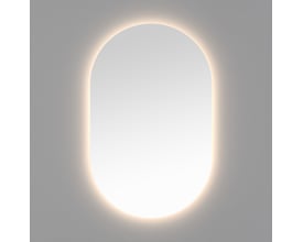 Loevschall Blokhus ovalt spejl belyst af integreret backlight, med en blød varm glød rundt om kanten.