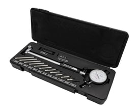 Diesella cylindermålersæt i sort kuffert, viser måler med urskive og udskiftelige mellemstykker til måling 50-160mm.