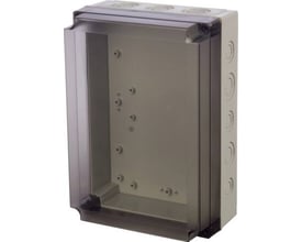 Fibox MNX montageboks i lys grå RAL 7035 med transparent dæksel af slagfast polycarbonat, der viser interiør og udbrudspunkter.