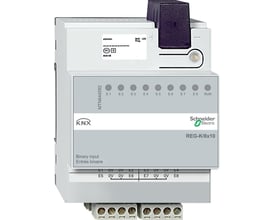 Schneider Electric KNX binær indgang REG-K/8x10 med otte indgange E1-E8 og RUN-indikator, monteret på DIN-skinne.