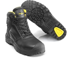 Mascot Batura Plus 1142 sikkerhedsstøvle i sort læder med gule detaljer og kraftig ydersål, vist fra siden med en anden støvle bagved.