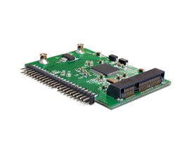 DeLOCK mSATA-til-IDE-adapter på grønt printkort, set skråt med IDE-stik og mSATA-tilslutning synlige.