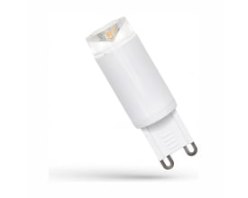 Hvid SpectrumLED G9 LED-pære med keramisk design, 2,5 W og 4000 K, set skråt med de to stifter synlige.
