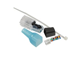 Nærbillede af Schneider Electric Actassi RJ45 Cat.6A UTP plug monteringskomponenter, med fokus på ledningsfarvekoder og stikdetaljer.