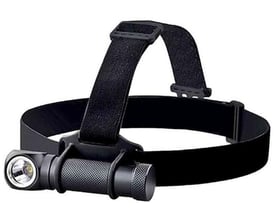 Sort Ironside genopladelig LED-pandelampe med cylindrisk lampehus monteret på et justerbart pandebånd.