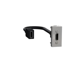 Schneider Electric New Unica enkelt HDMI udtag i aluminium med kabel og hun-stik, monteret på en lys baggrund.