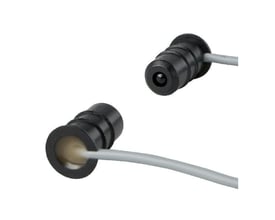 Carlo Gavazzi fotoaftaster som modtager, sort og cylindrisk med gråt kabel og optisk åbning, vist fra to vinkler.