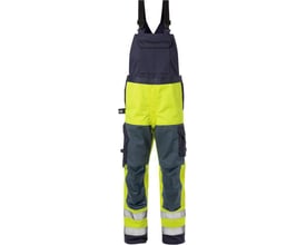 Kansas Flame HiVis Overall 125943 i gul og mørkeblå med reflekser og flere lommer, vist forfra.