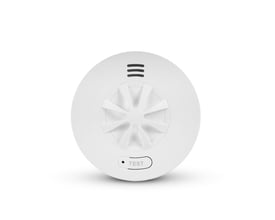 Hvid, rund Housegard Luma trådløs varmealarm med indbygget 10-års batteri og synlig testknap.
