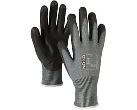 Nærbillede af Boisen Safety Cut Basic 9000 handsken, der viser OX-ON logo, størrelse 11 og detaljer om skærehæmmende standard C.