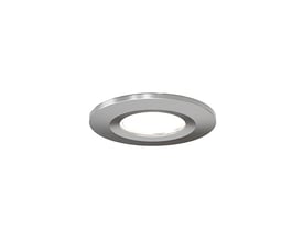 Ansell Lighting Prism Pro XM-frontdel i satin krom, vist skråt med en rund ring og åbning i midten.