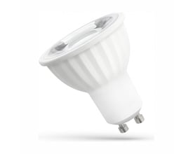 SpectrumLED GU10 LED-pære på 6 W med hvidt hus og to stifter, set skråt forfra; lyset er 3000 K.