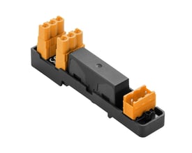 Weidmüller interfacemodul med mørk holder og orange terminaler og stikforbindelse, set skråt ovenfra.