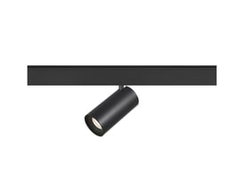 Helhedsindtryk af en enkelt sort SLV NUMINOS S spot, der lyser fra en sort skinne på hvid baggrund.