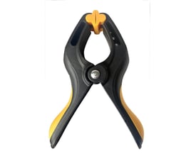 Ironside limklemme med 65 mm spændevidde, set forfra med sorte arme, gule greb og orange bevægelige bakker.