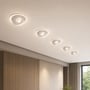 Fem tændte V-TAC COB LED-downlights sidder på række i et loft og lyser ned i rummet.