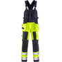 Kansas Fristads Flamestat Hi-Vis overalls i gul og marineblå, str. C62, vist forfra med mange lommer og metalfri lukning.