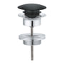 Grohe push-up bundventil i velvet black med krom detaljer, vist som adskilt enhed.