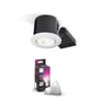 Philips Hue indbygningsspot, rund model, i mat hvid med en sort bagside, sat sammen med en Philips Hue Color & White Ambiance pære og emballage.