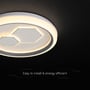 V-TAC LED-loftslampen lyser varmt, set skråt nedefra med ring og geometriske felter.