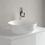Villeroy & Boch Artis 4179 håndvask set forfra på en hvid bordplade med høj, kromfarvet vandhane bagved.