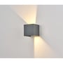 LEDlife CUBIC PRO væglampe set fra siden på væggen med brede, varme lysstråler opad og nedad.