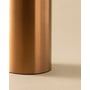 Cosmic fritstående toiletbørste i elegant kobberfinish, viser den cylinderformede beholder og den diskrete skygge på en lys baggrund.