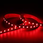 Ansell Lighting U-Cell RGBW LED strip på 20 meter i rød glødende belysning, hvilket viser dens farveegenskaber.