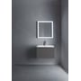 Duravit L-Cube underskab i mørkegrå med et udtræk, monteret under et hvidt vaskebord med oplyst spejl over.