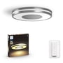 Philips Hue Being loftslampe vist sammen med emballagen og den medfølgende hvide Hue Dimmer switch.