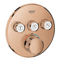 Grohe Grohtherm SmartControl termostat til indbygning i blank kobber med tre betjeningsknapper og en drejeknap til temperatur.