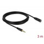 Sammenrullet sort Delock 3.5 mm stereo jack forlængerkabel på 3 meter, vist med han- og hunstik samt længdeangivelse.