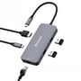 Verbatim USB-C Pro Multiport Hub med kabler og netværksstik vist som eksploderet billede på mørk baggrund.