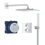 Grohe Precision termostat komplet brusersystem til indbygning med fokus på indbygningsdel, viser blå monteringsboks og krom termostatkontrol.