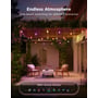 Govee Outdoor Solar String Lights hænger i flere rækker under en pergola med farvet lys i en have.