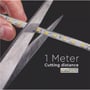 Tegning viser LEDlife LED-strip Type Q, der klippes over med en saks; skæreafstanden er markeret til 1 meter.