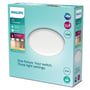 Philips Cavanal loftlampe i hvid emballage, med LED, Sceneswitch og IP44-certificering vist på en lys mintgrøn baggrund.