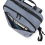 Nærbillede af lommerne på Dicota Eco Backpack Slim MOTION 13 - 14.1" rygsækken med en telefon og notesbog.