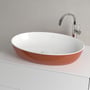 Villeroy & Boch Artis håndvask, 61 cm, BiColour orange, oval bordstående model i hvid med orange yderside.