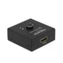 Nærbillede af den sorte DeLock 2-til-1 HDMI switch, der viser en HDMI-port på siden og den bidirektionelle switch-funktion.