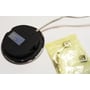 Bagsiden af ID-LED 12 V-spottet med ledning ved siden af en pose med monteringsdele.