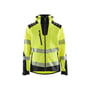 Detaljeret frontvisning af Blåkläder Workwear high vis softshell jakke i gul/sort, størrelse L, med synlige lynlåslommer og stofstruktur.
