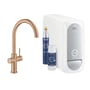 Grohe Blue Home startpakke med C-tud armatur i børstet warm sunset, kulfilter og CO2-cylinder. Hvidt køkkenarmatur med tilbehør.
