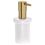 Grohe Essentials sæbedispenser i messing med mat hvid glasbeholder og poleret messing pumpe på hvid baggrund.